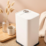 Ultra-Slim White Press-To-Open Trash Can with Orange Base